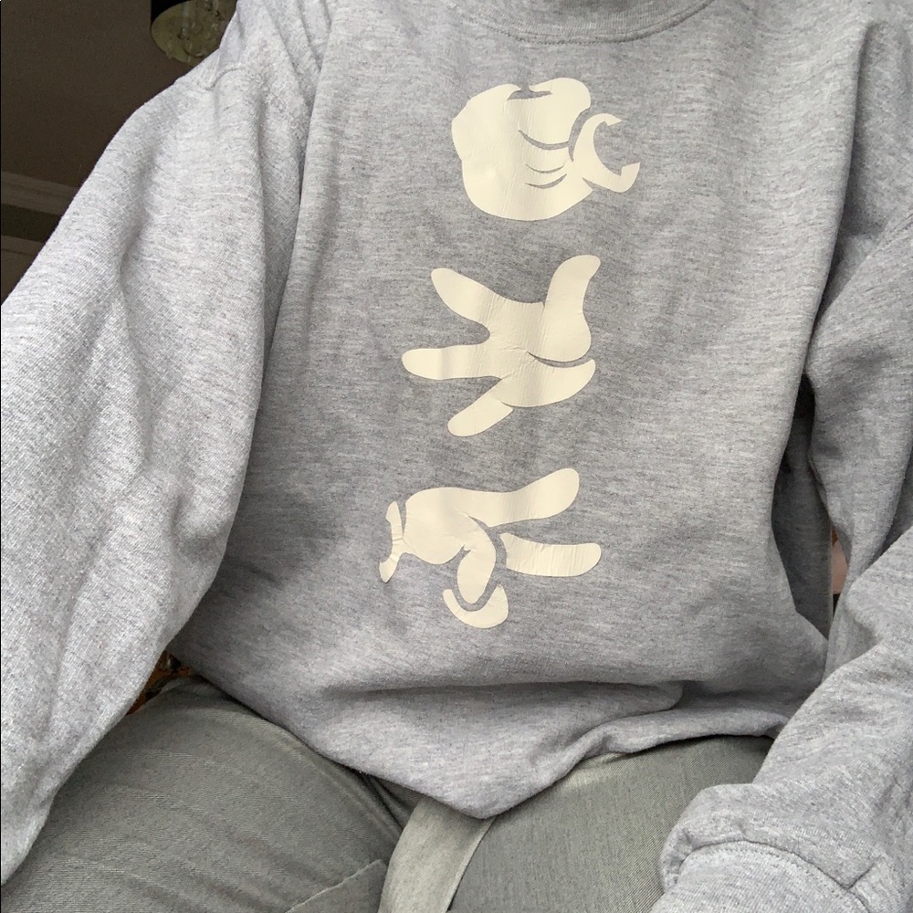 Grey used sweater with Mickey Mouse hands